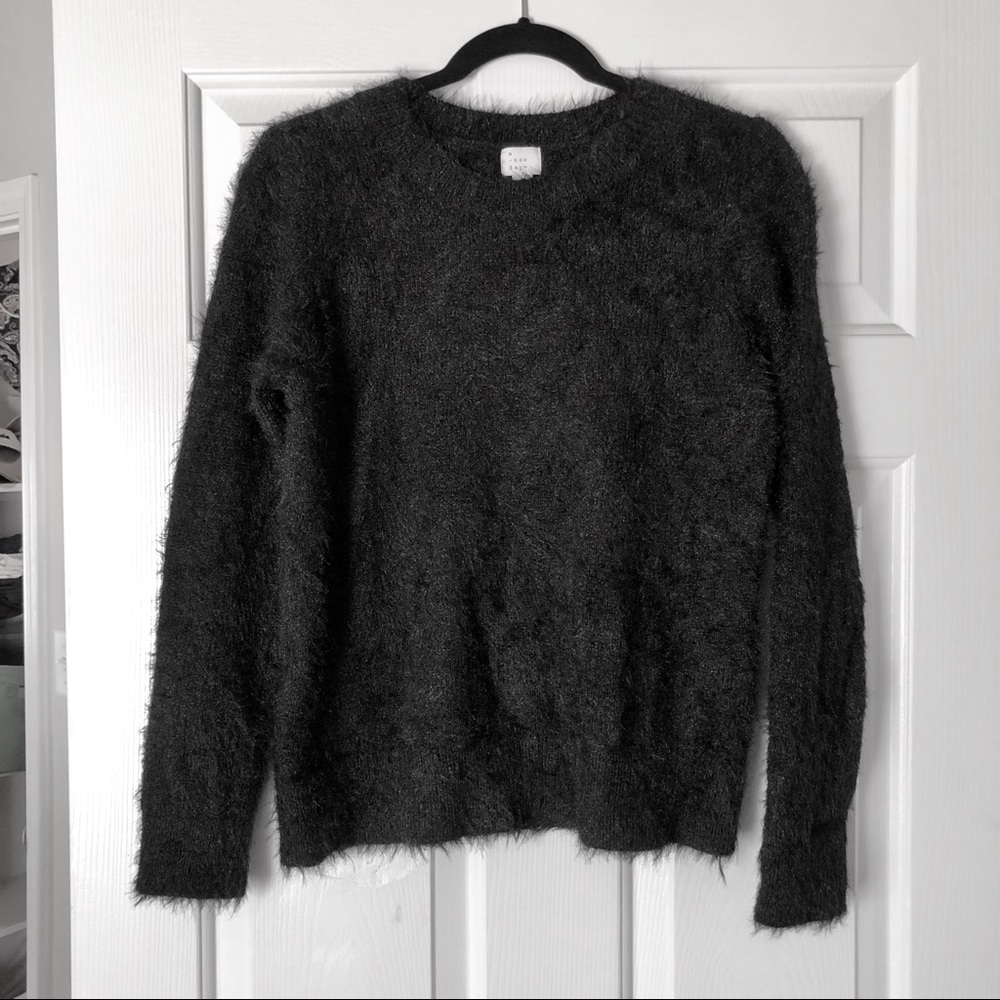 A new day fuzzy sweater